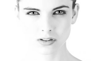 Modere Homepage pic is a black and white image of a woman
